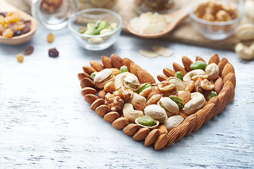Delicious snack of almonds and pistachios